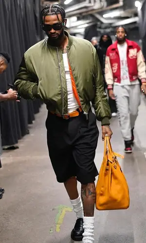 Nickeil Alexander-Walker wearing Bottega Veneta boots