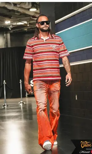 Patty Mills’ Outfit in Denim Tears Shirt, Cout De La Liberte Jeans & Dior (2023)
