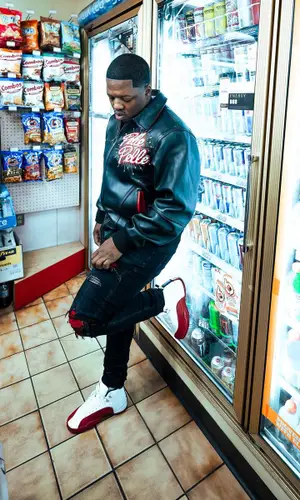 Lil Zay Osama’s Outfit in Pelle Pelle Jacket, Amiri Jeans & Jordan Sneakers (2023)