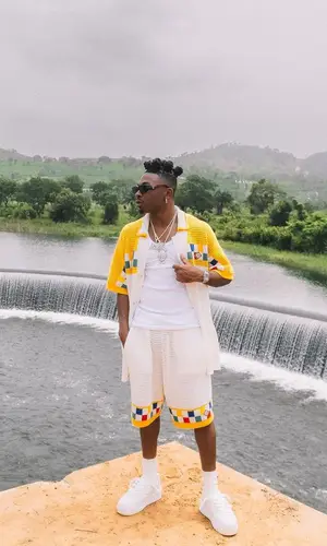 Mayorkun wearing Casablanca shirt