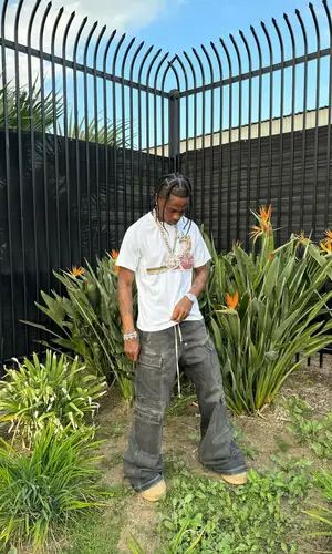 Travis Scott wearing Rick Owens jeans