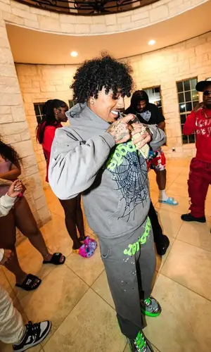 King Cid wearing Spider Worldwide hoody