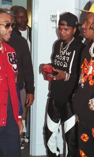 Rich The Kid wearing Denim Tears hoody