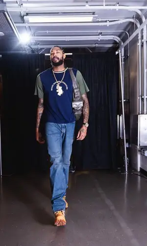 Brandon X. Ingram wearing Balenciaga bag