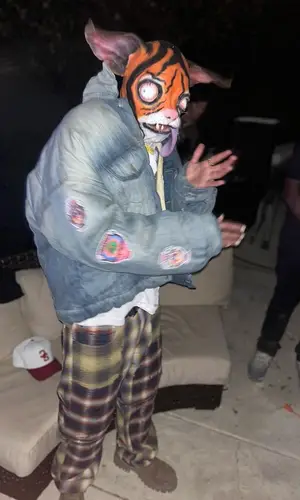 Chris Brown’s Outfit in Saint Michael T-Shirt, Givenchy Pants & Balenciaga Boots (2023)