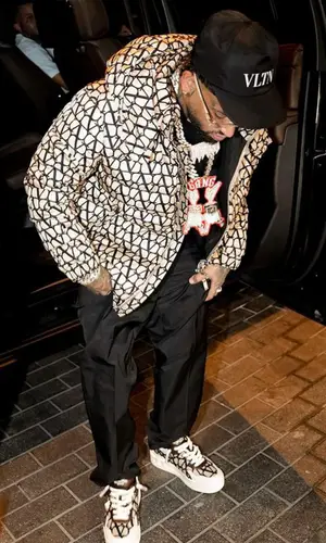 Bryant Mayers wearing Valentino cap