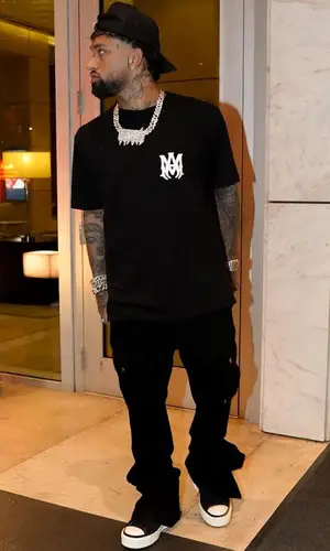 Bryant Mayers wearing Amiri t-shirt