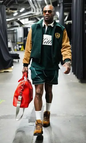 PJ Tucker’s Outfit in Kith Jacket, Brunello Cucinelli Boots & Louis Vuitton Bag (2023)