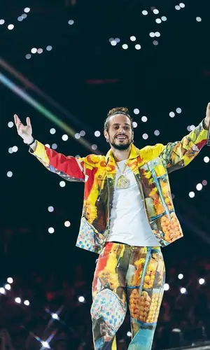 Russ’ Outfit in KidSuper Jacket & Louis Vuitton Sneakers (2023)