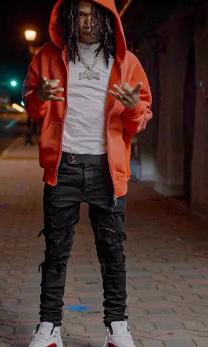 B Lovee’s Outfit in Purple Brand Hoodie, Jordan Sneakers & Louis Vuitton Belt (2023)