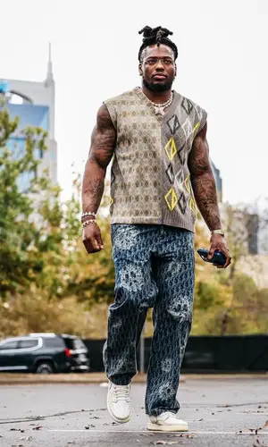 Derrick Henry wearing Dior jeans