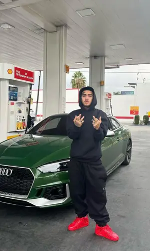 MoneySign Suede wearing Jordan sneakers