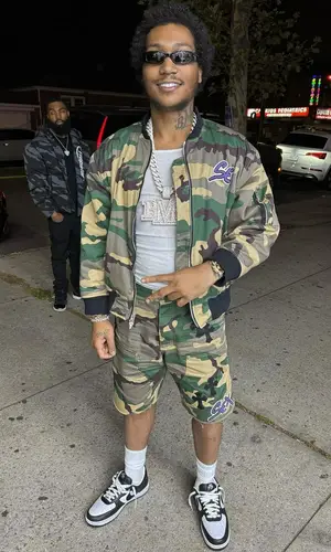 Lil Meech wearing Chrome Hearts jacket