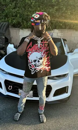 Chief Keef wearing Gnarcotic t-shirt