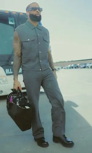 Odell Beckham Jr’s Outfit in Miu Miu Jacket, Bottega Veneta Bag & Rick Owens Eyewear (2023)