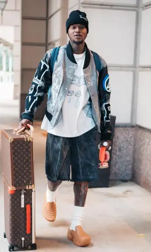 Terry Rozier’s Outfit in Louis Vuitton Backpack & Saint Michael Hat (2023)