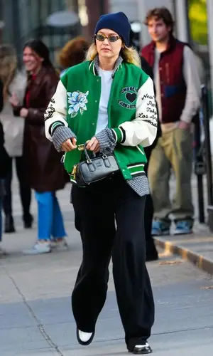 Gigi Hadid’s Outfit in Awake NY Jacket, Miu Miu Bag & Guest In Residence Hat (2023)
