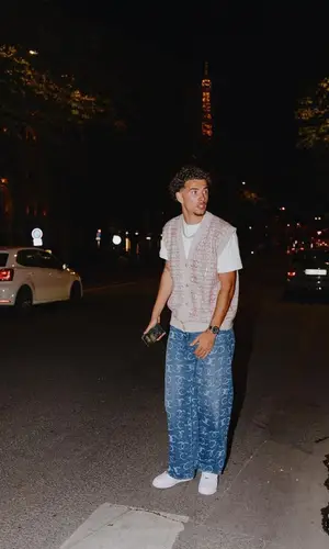 Curtis Jones wearing Chanel jeans