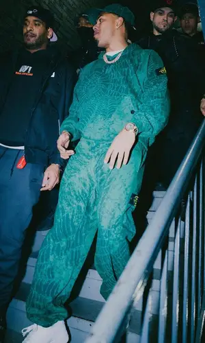 Myke Towers wearing Supreme hoody