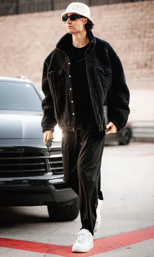 Josh Giddey wearing Prada eyewear