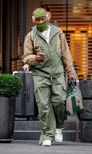 Terry Rozier’s Outfit in Gucci Jacket, Jordan Sneakers & Apple (2023)