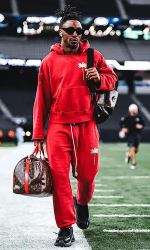 Jordan Whitehead wearing Prada eyewear