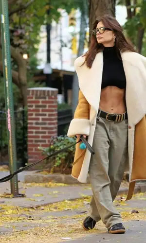 Emily Ratajkowski’s Outfit in Puma Sneakers, Khaite Belt & Lexxola Eyewear (2023)