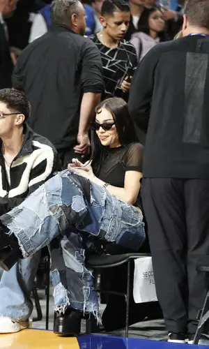 Danna Paola wearing Versace boots
