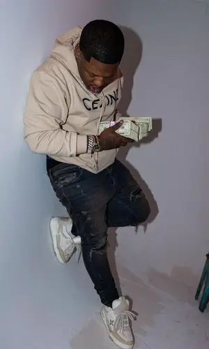 Lil Zay Osama’s Outfit in Celine Hoodie, Amiri Jeans & Louis Vuitton Sneakers (2023)