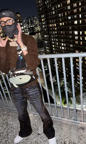 Luh Tyler wearing Sniper Gang Apparel hat