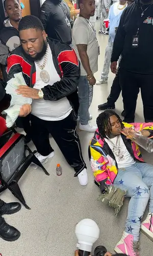 Rod Wave wearing Sergio Tacchini jacket