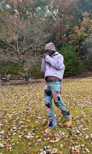 Kai Cenat wearing Balenciaga belt