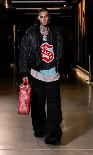 Jordan Clarkson wearing Goyard bag