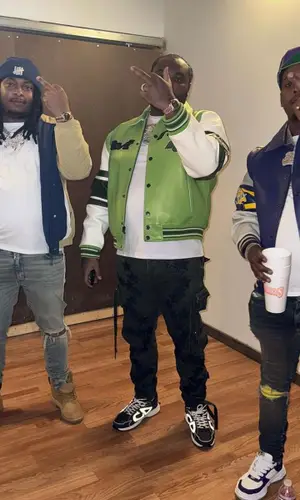Baby Money’s Outfit in Avirex Jacket, Amiri Jeans & Maison Mihara Yasuhiro Sneakers (2023)