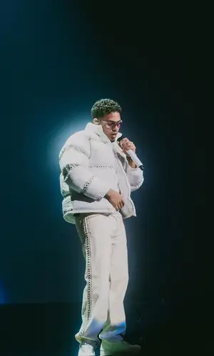 Myke Towers’ Outfit in Supreme Jacket, Oakley Eyewear & B.B. Simon (2023)