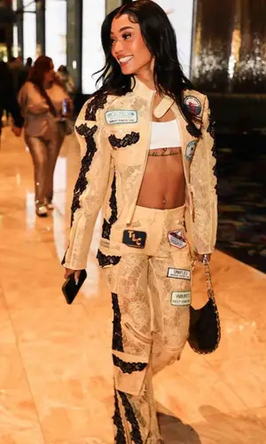 Coi Leray wearing Yuhan Wang jacket