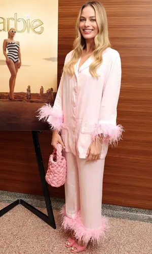 Margot Robbie wearing Anita Ko jewelry