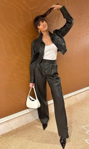 Nina Dobrev wearing Anine Bing boots