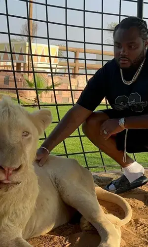 Tee Grizzley wearing Louis Vuitton sandal