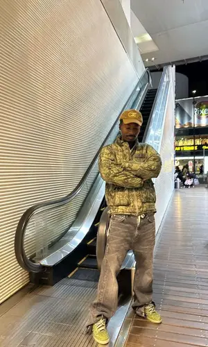 Bruce Ray wearing Undercover jacket