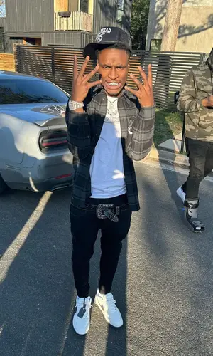 Mudbaby Ru wearing Off-White shirt