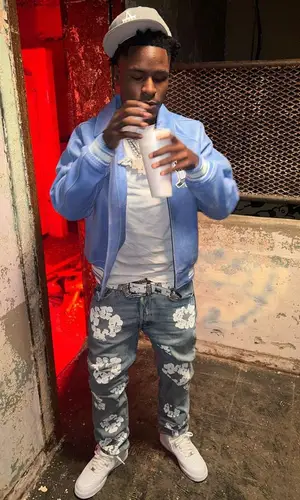 Mudbaby Ru wearing Denim Tears jeans