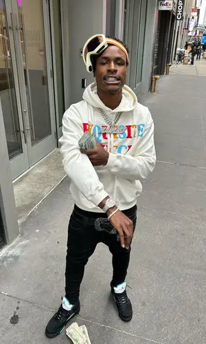 Mudbaby Ru wearing Gucci hoody