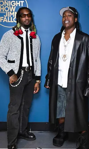Offset wearing Ernest W. Baker sweater