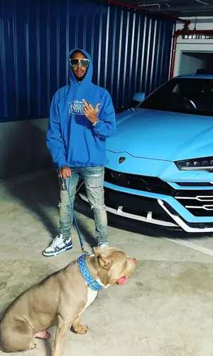 Dirtbike LB’s Outfit in Balenciaga Hoodie, Amiri Jeans & Louis Vuitton Eyewear (2023)