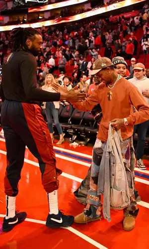 Travis Scott wearing Vintage top