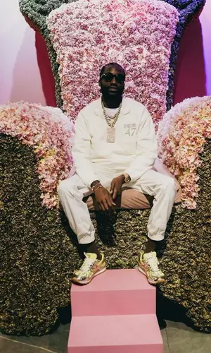 Meek Mill wearing Dior sweater