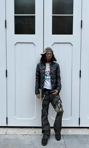 Lil Tecca wearing Ed Hardy cap