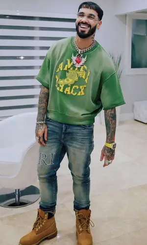 Anuel AA wearing Amiri t-shirt