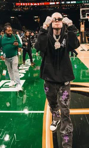 Millyz wearing Chrome Hearts hoody